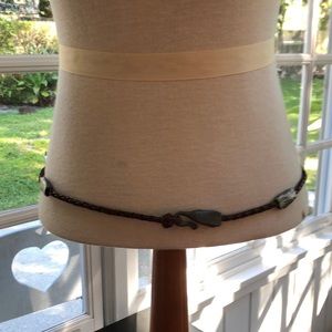 DKNY belt 34” from one end to another.  Thin braided belt with silver weights.